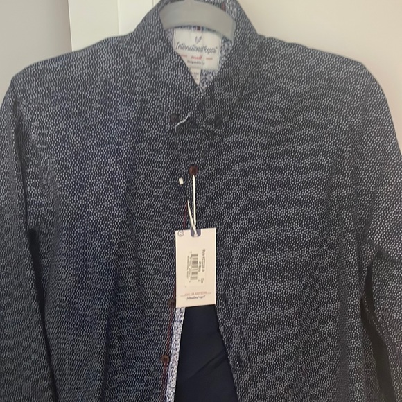 Other - New Men’s long sleeve navy blue shirt with small white design-size small.